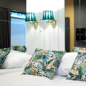 Postel nebo postele na pokoji v ubytování Wave3 - Monte Cassino by OneApartments