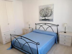 Letto o letti in una camera di Alghero Mare Chiaro-Guest House