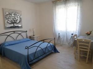 Letto o letti in una camera di Alghero Mare Chiaro-Guest House