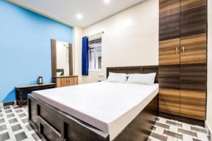 Postel nebo postele na pokoji v ubytování Hotel Vivek