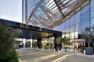 a rendering of a building with a glass facade at Address Sky View in Dubai