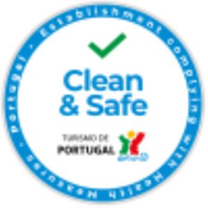 a clean and safe logo with a person in the middle at Apartamentos Turisticos Nossa Senhora Da Estrela in Rosário-Lagoa