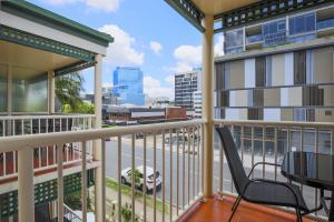 a view from a balcony of a building with a view of a city at Toowong Central Motel Apartments in Brisbane