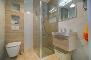O baie la Apartment Jardin with free cowered parking +37 fotografii
