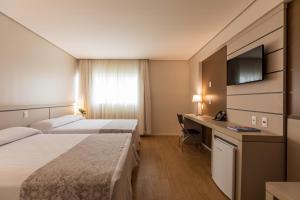 Cama ou camas em um quarto em Viale Tower Hotel