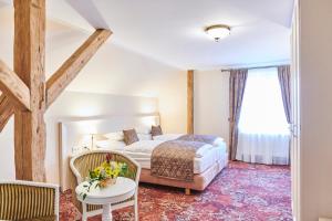 Postel nebo postele na pokoji v ubytování Spa Hotel Centrum