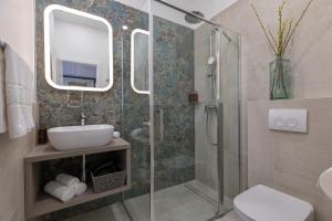 Koupelna v ubytování Green Park Luxury Rooms + 37 fotografií