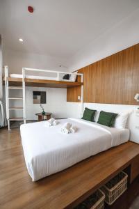 Ein Bett oder Betten in einem Zimmer der Unterkunft Hidden Garden Hostel