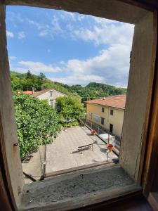 a view from a window of a courtyard at Apartment zeus Lizzano in Veccialone