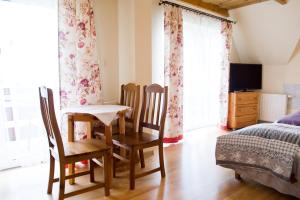 Łóżko lub łóżka w pokoju w obiekcie Willa u Bohuna Jacuzzi & Sauna
