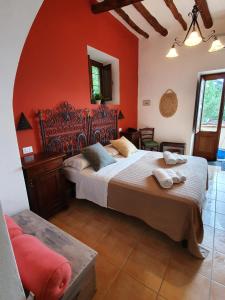 En eller flere senge i et værelse på B&B La Goletta di Salina