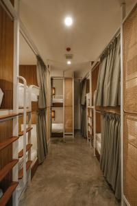 Ein Bett oder Betten in einem Zimmer der Unterkunft Hidden Garden Hostel