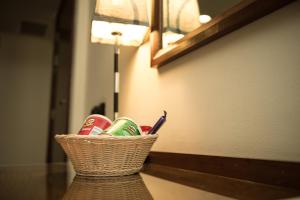 
a basket filled with lots of different types of items at Cherry Maryski Hotel in Alexandria

