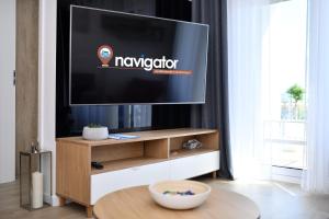 Televízia a/alebo spoločenská miestnosť v ubytovaní Apartamenty NAVIGATOR PORT-NADMORSKIE TARASY Brilliant 613