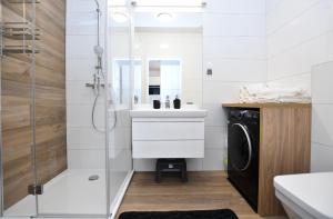 Kúpeľňa v ubytovaní Apartamenty NAVIGATOR PORT-NADMORSKIE TARASY Brilliant 613