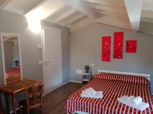 Postel nebo postele na pokoji v ubytování Corte Clocego