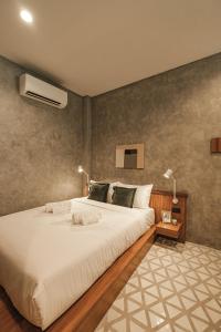Ein Bett oder Betten in einem Zimmer der Unterkunft Hidden Garden Hostel
