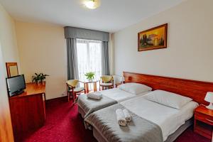Postel nebo postele na pokoji v ubytování Panorama_SPA