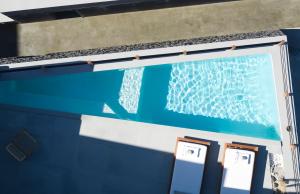 a window on the side of a boat at Melidonia Suites in Akrotiri