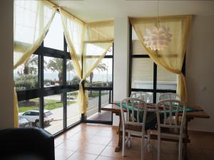 Posezení v ubytování NINFA Apartamento con balcón ideal familias con vistas al mar