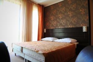 Katil atau katil-katil dalam bilik di Villa Reza