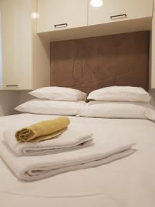 Postel nebo postele na pokoji v ubytování Kamp Karla & Bruno
