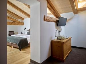 Postel nebo postele na pokoji v ubytování Romantic Hotel Excelsior