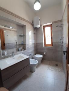 ห้องน้ำของ Capo Grillo Cottage Villa