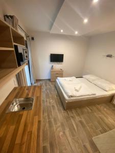 Posteľ alebo postele v izbe v ubytovaní Silver Relax Siófok