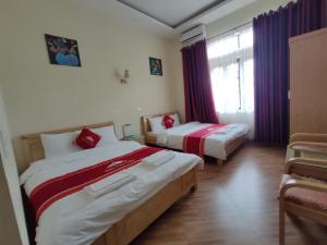 Postel nebo postele na pokoji v ubytování Sa Pa New Villa