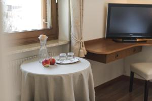 TV a/nebo společenská místnost v ubytování Untermairhof B&B Christine + 29 fotografií
