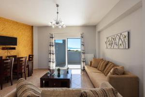 Telewizja i/lub zestaw kina domowego w obiekcie Helena's Aparthotel , Scaleta