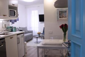 Kuchyň nebo kuchyňský kout v ubytování Love Apartment Rovinj