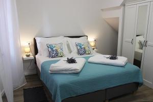 Postel nebo postele na pokoji v ubytování Love Apartment Rovinj