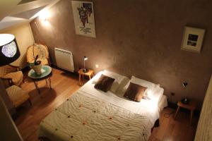 Ένα ή περισσότερα κρεβάτια σε δωμάτιο στο Côté Chambres