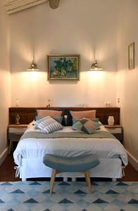 Tempat tidur dalam kamar di Bastide des Demoiselles