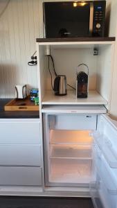 Kuchyň nebo kuchyňský kout v ubytování Guesthouse Zandvoort