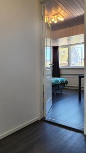 Postel nebo postele na pokoji v ubytování Guesthouse Zandvoort