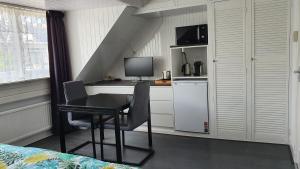 Kuchyň nebo kuchyňský kout v ubytování Guesthouse Zandvoort