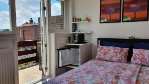 Postel nebo postele na pokoji v ubytování Guesthouse Zandvoort