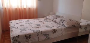 Postel nebo postele na pokoji v ubytování Ana Andreskic
