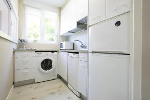 A kitchen or kitchenette at Olabide by Smiling Rentals