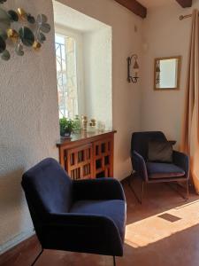 Posezení v ubytování Hotel Maquis et Mer