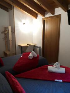 Ein Bett oder Betten in einem Zimmer der Unterkunft LA PANDELA