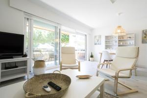 A television and/or entertainment centre at Olabide by Smiling Rentals