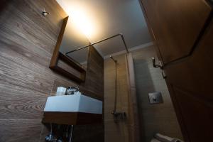 Koupelna v ubytování Abella Hotel