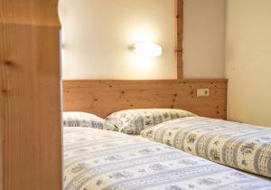 Postel nebo postele na pokoji v ubytování Aria D'Bosch