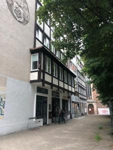 Bygningen som lejligheden ligger i + 10 billeder