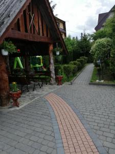 a brick walkway in front of a building at Willa u Magdy in Zakopane
