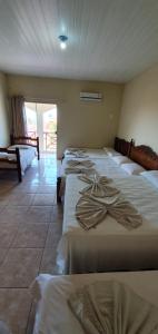 Ліжко або ліжка в номері Hotel Brisas